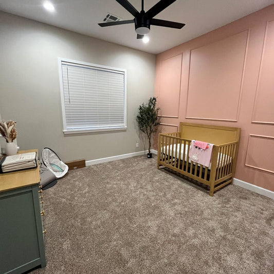 Custom 3-over-3 peel and stick wall molding kit installed in a nursery, featuring a wide middle frame design for a modern interior look