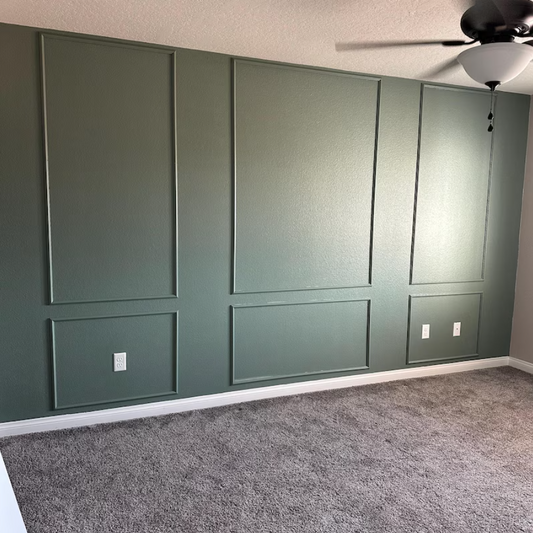 6 wall frames installed in a room