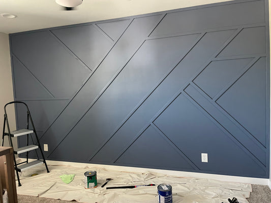 modern wall moldng pieces installed ina nursery room