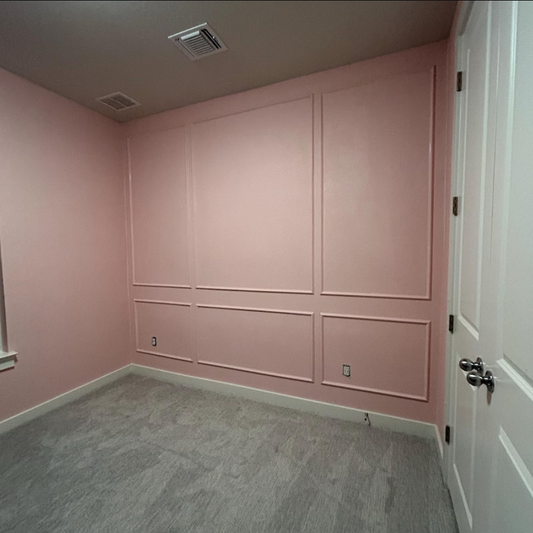 Bathroom wall featuring a custom 3-over-3 peel and stick molding kit, wide center frame design