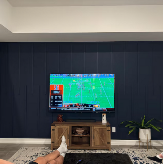 Bespoke wall molding in the tv room