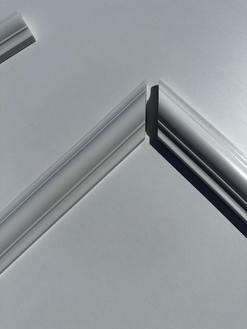 Close-up of wall molding pieces showing clean edges