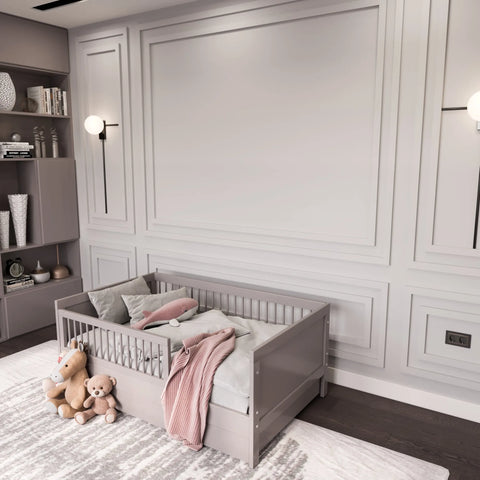 Nursery wall molding kit with 3 upper and 3 bottom nested frames installed on pastel wall