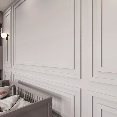 Pre-cut nursery wall molding frames arranged in soft-colored baby room design