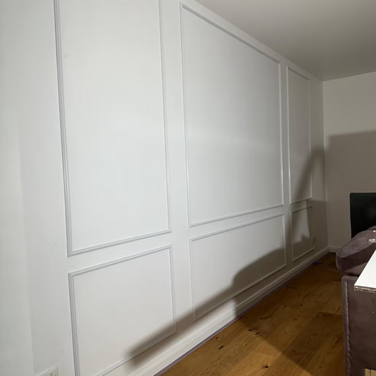 wall molding accent wall molding installed in a living room